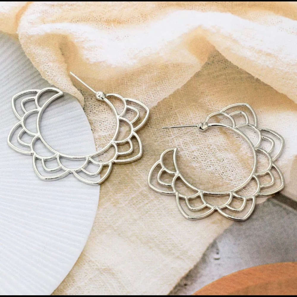 Silver flower silhouette earrings